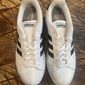 Women’s black and white adidas size 8.5